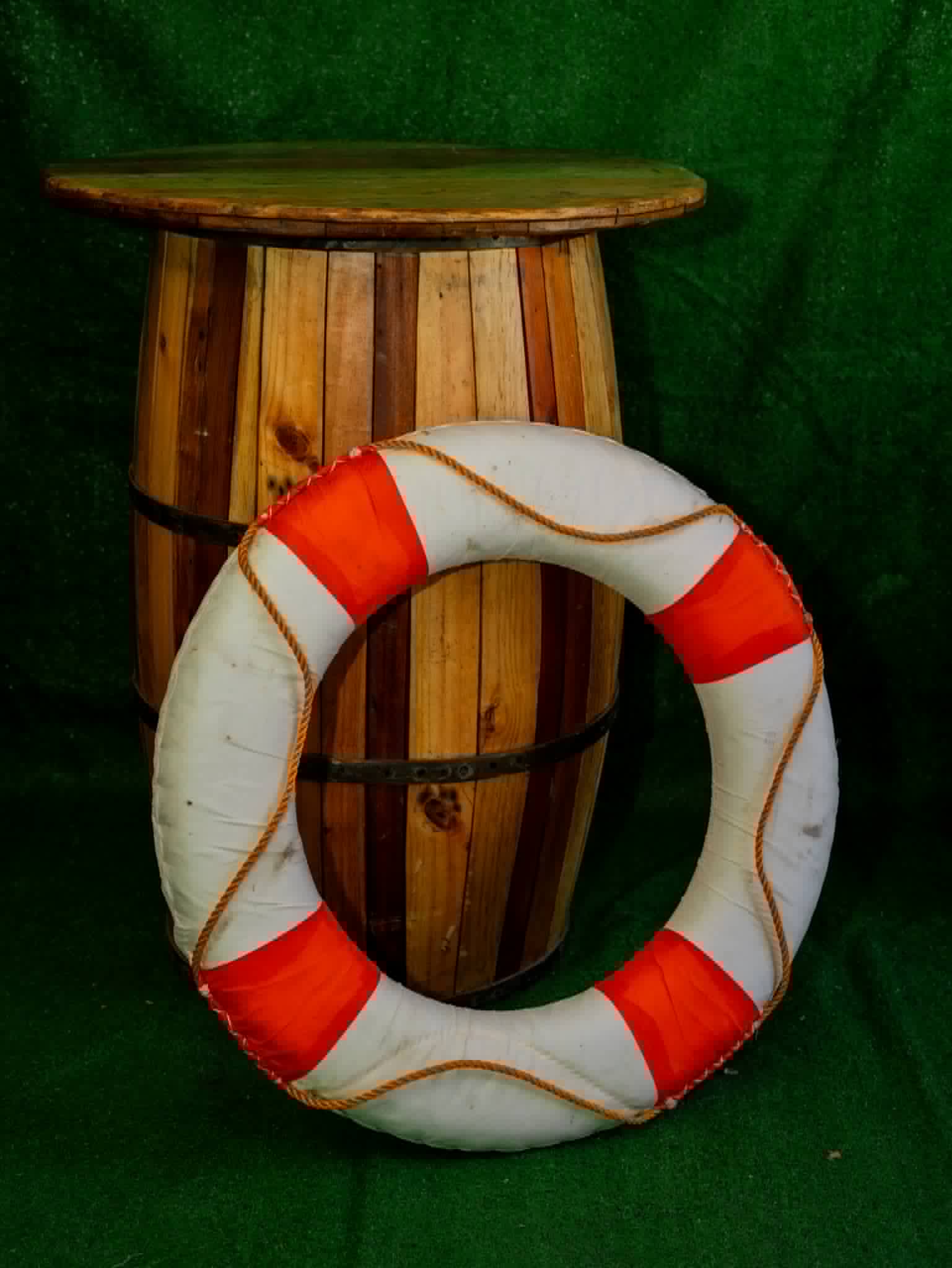 Decorative white life ring with orange bands