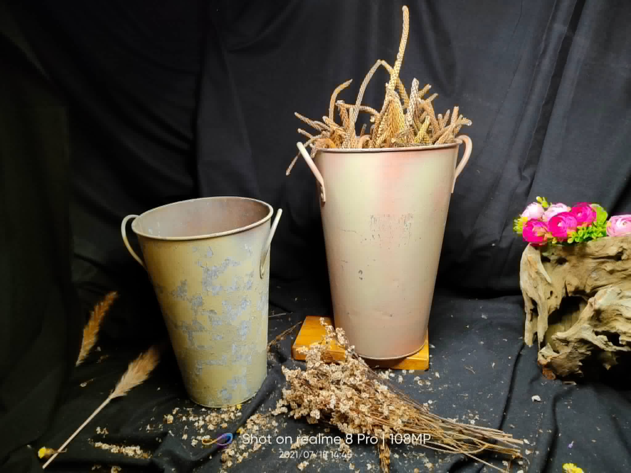 Tall floral-patterned metal pails in mixed sizes