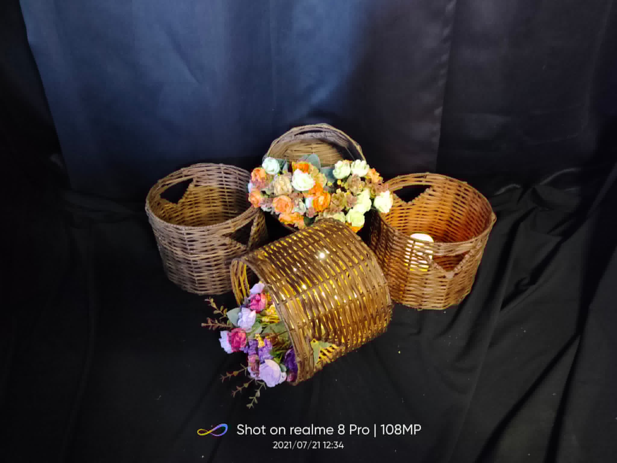 Assorted woven wicker baskets decorated with flowers