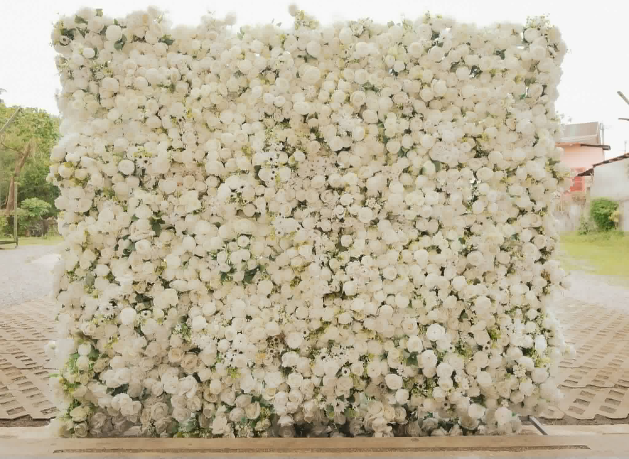 Full dense white flower wall photographed outdoors