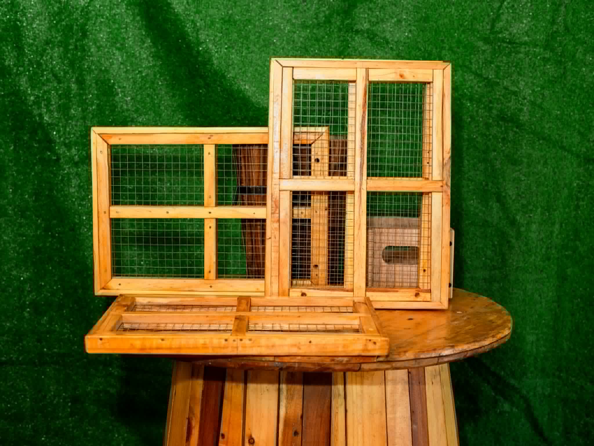 Set of freestanding natural wood frames with wire mesh panels