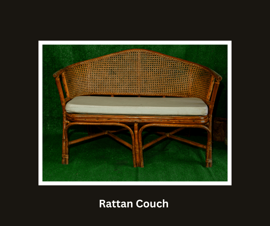 Curved natural rattan couch with a white seat cushion
