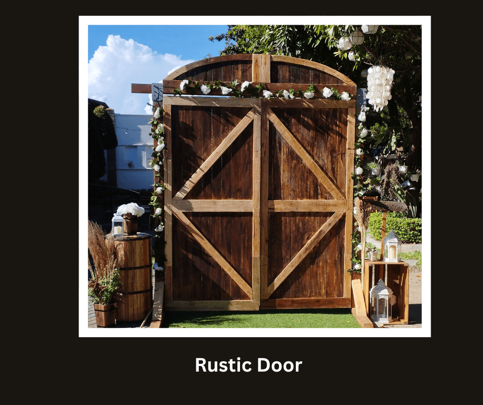 Freestanding rustic double barn door with dark metal hardware
