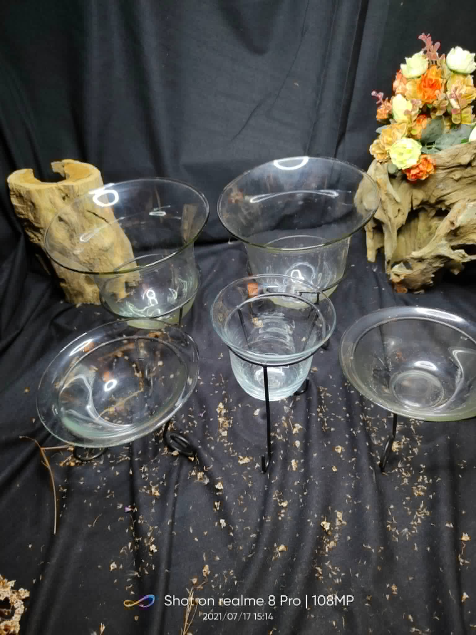 Assorted clear glass bowls and pedestal vessels