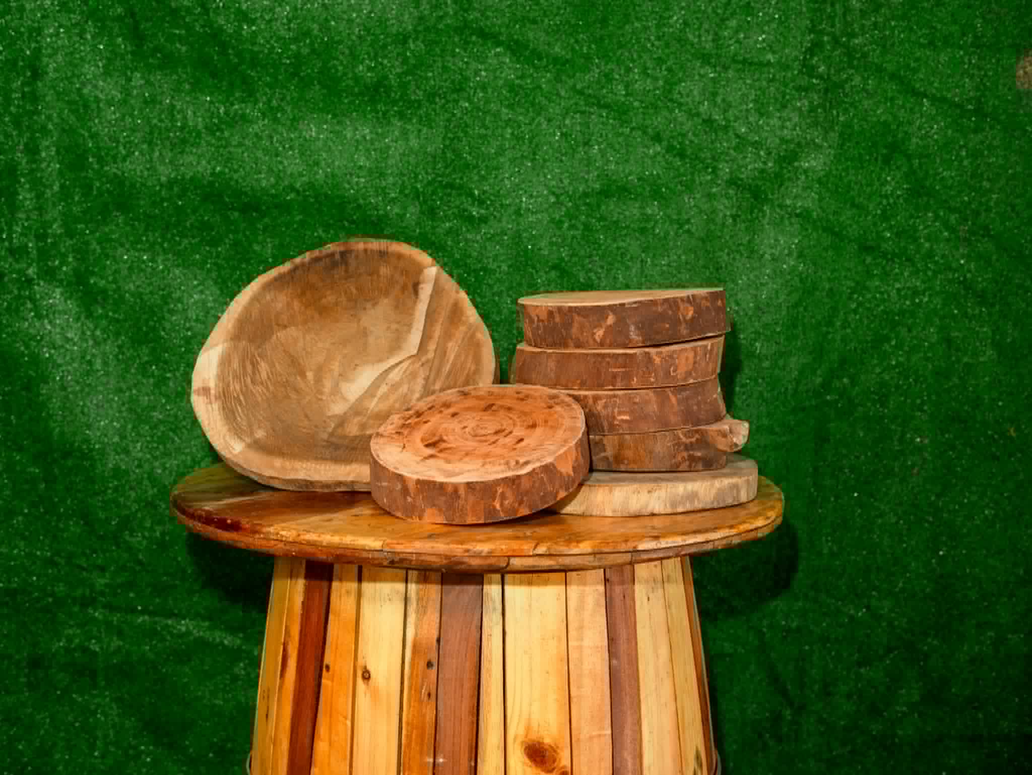 Assorted natural wood slices and small rustic display risers