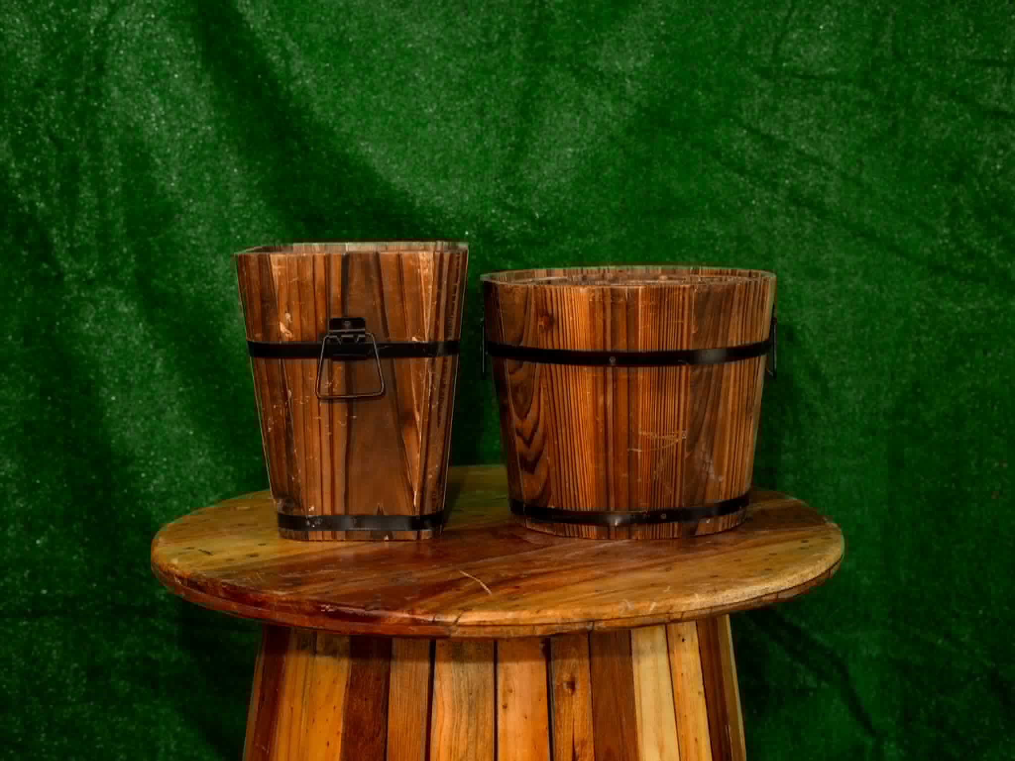 Pair of rustic slatted wooden buckets in two sizes