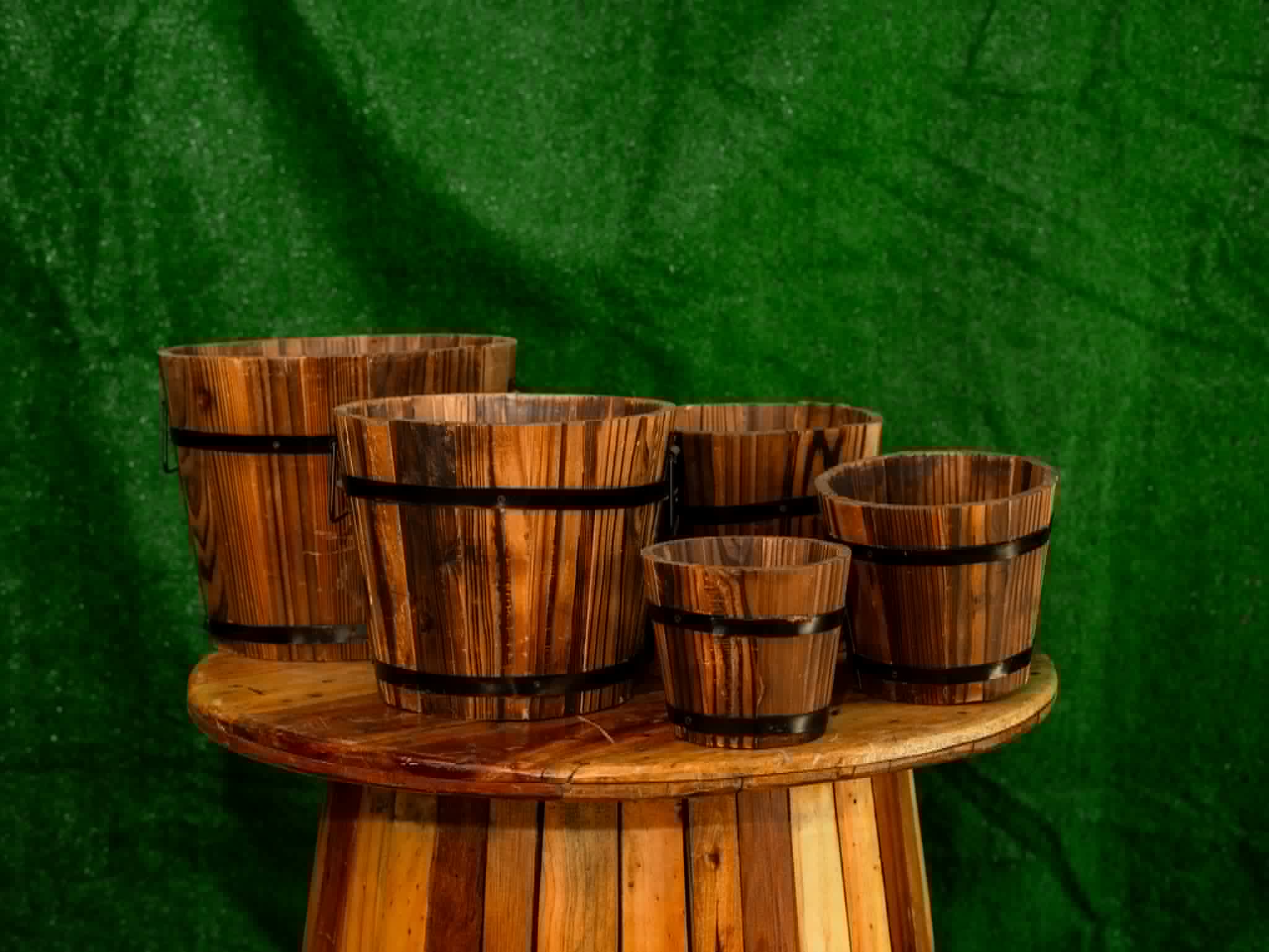 Graduated set of rustic slatted wooden buckets