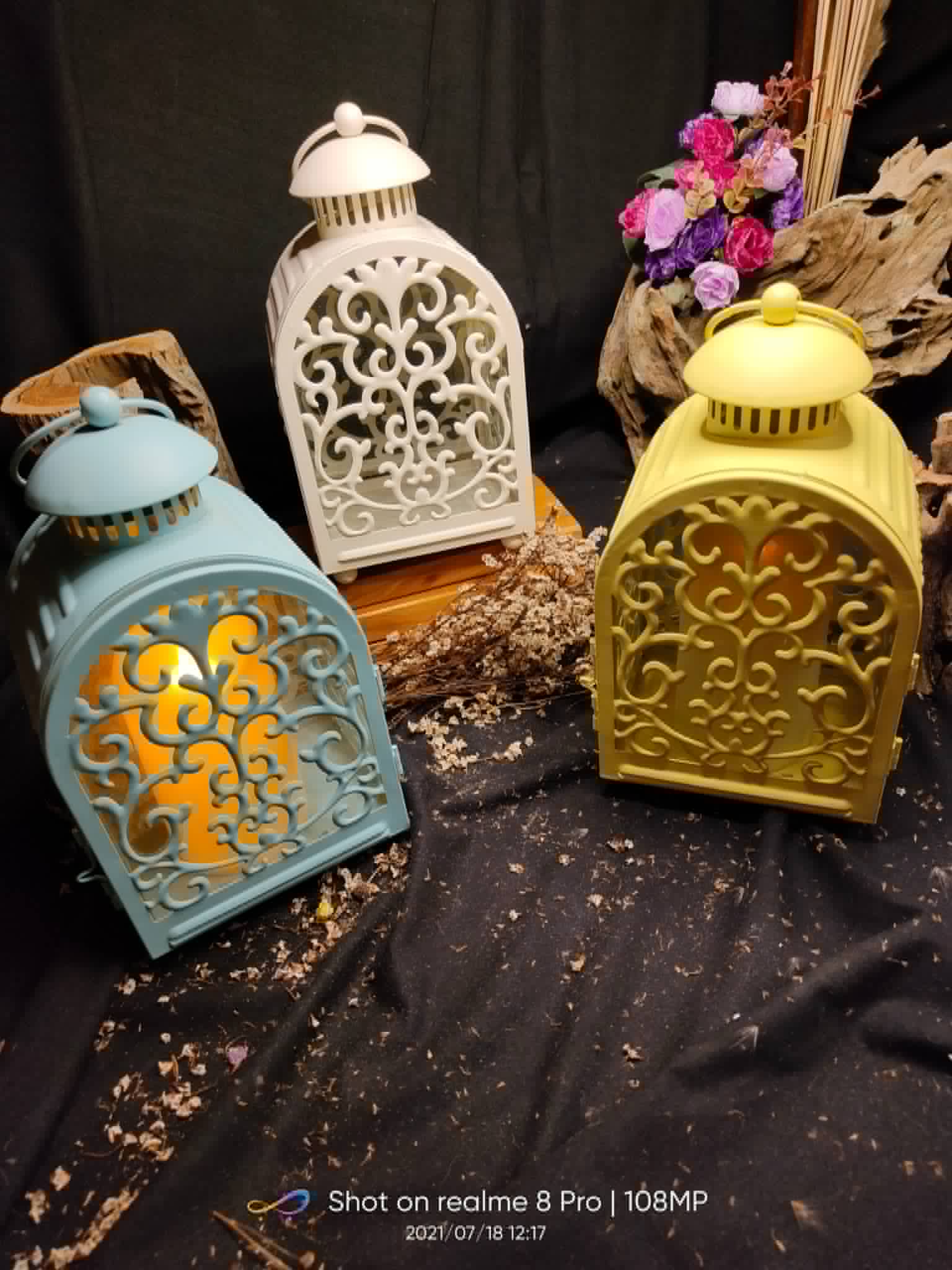 Ornate lantern set in white, blue, gold, and yellow finishes