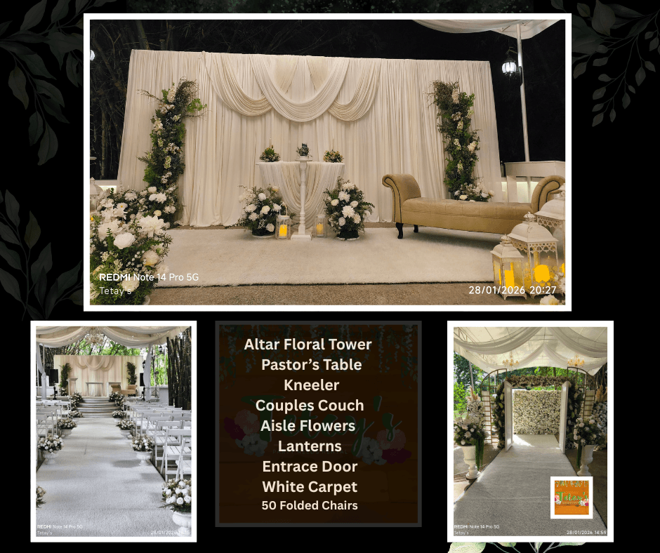 Indoor wedding altar with cream curtains and flowers