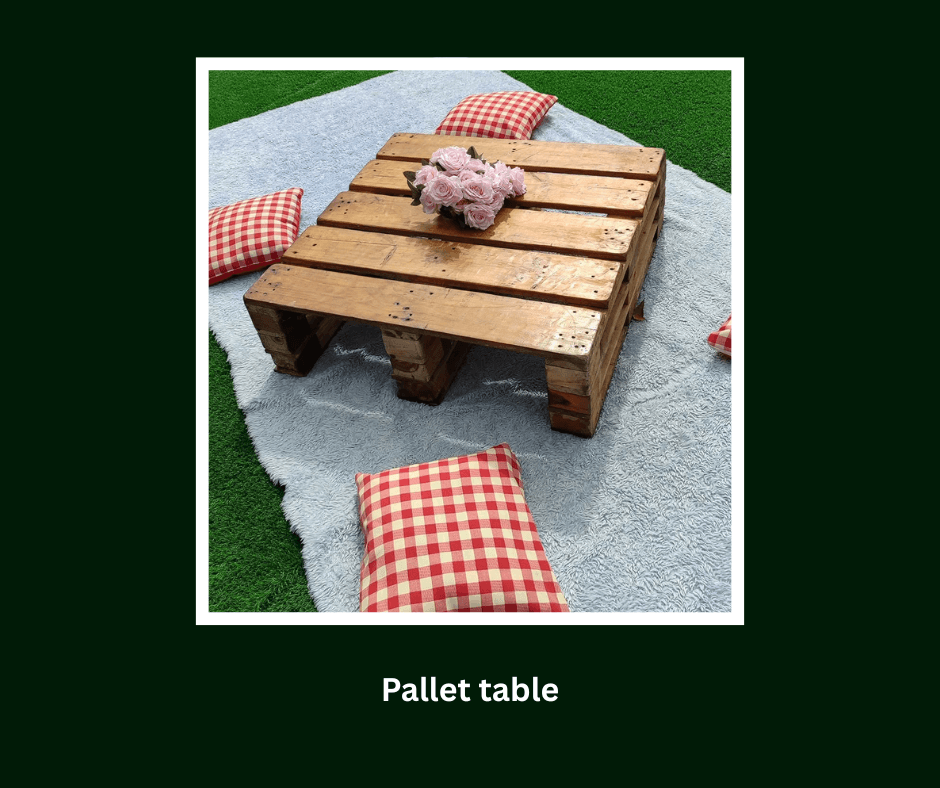Low square pallet table styled with floor cushions