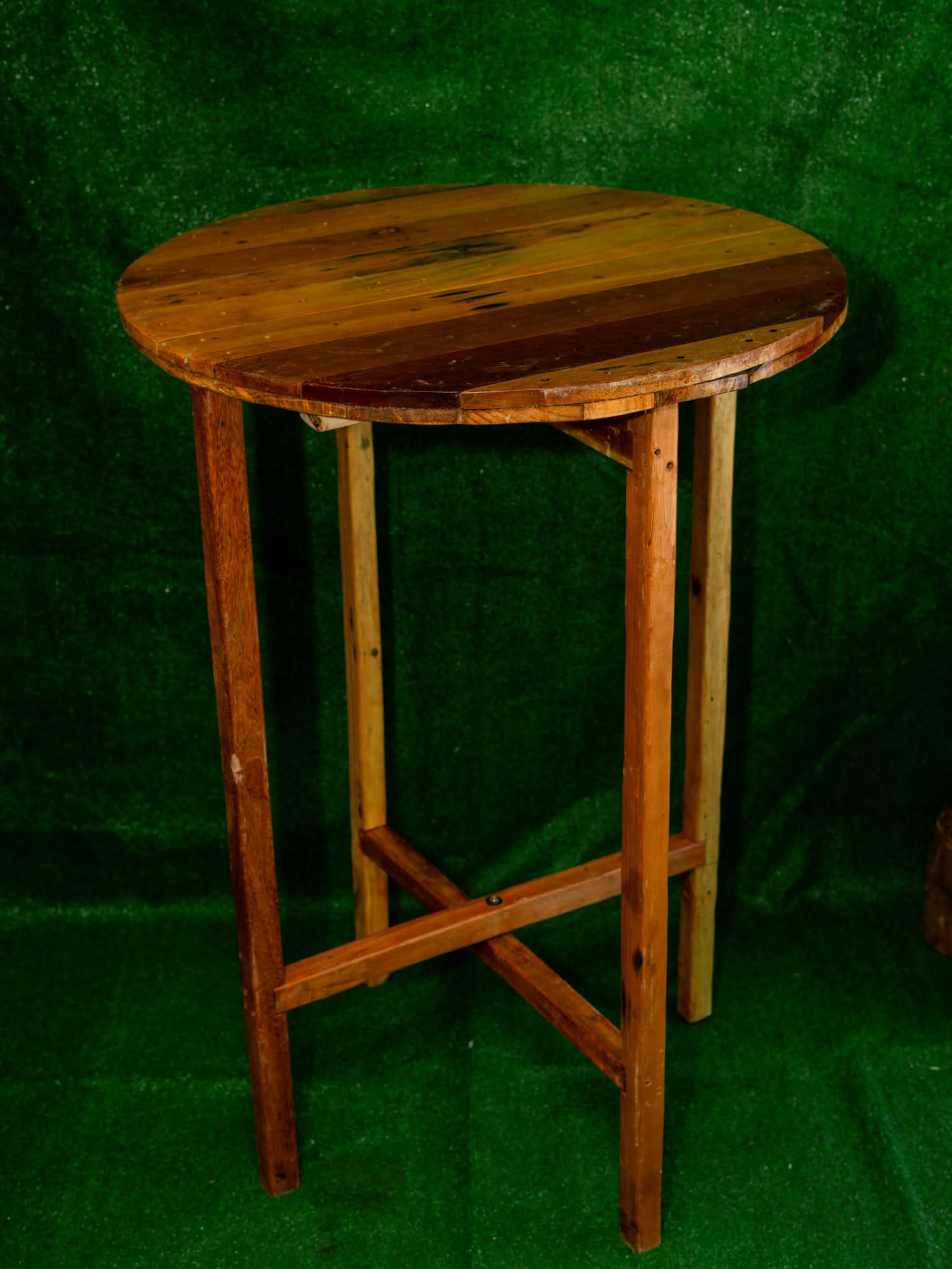 Round wooden poseur cocktail table