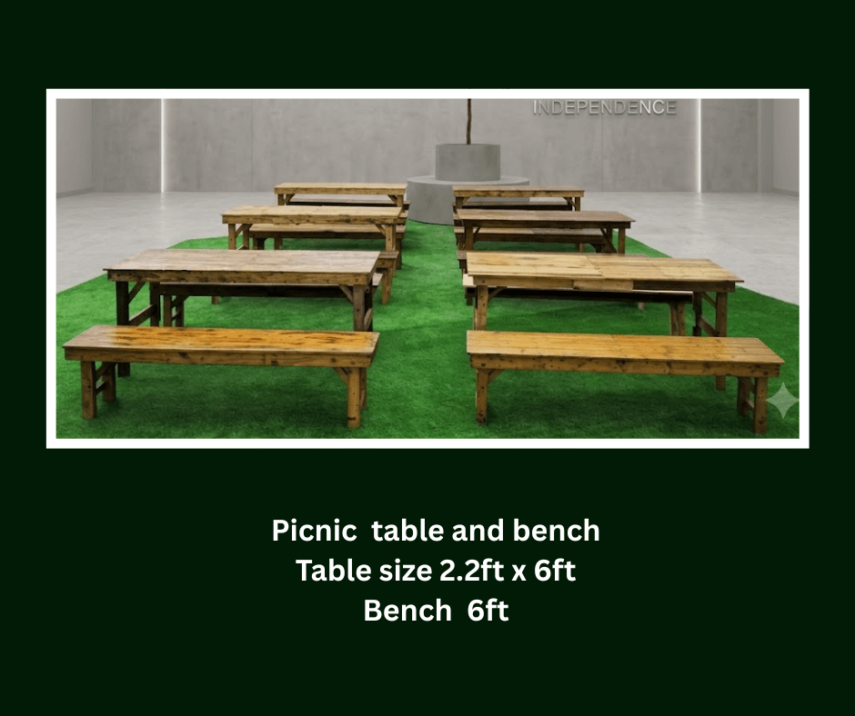 Rustic picnic tables and matching six-foot benches displayed indoors